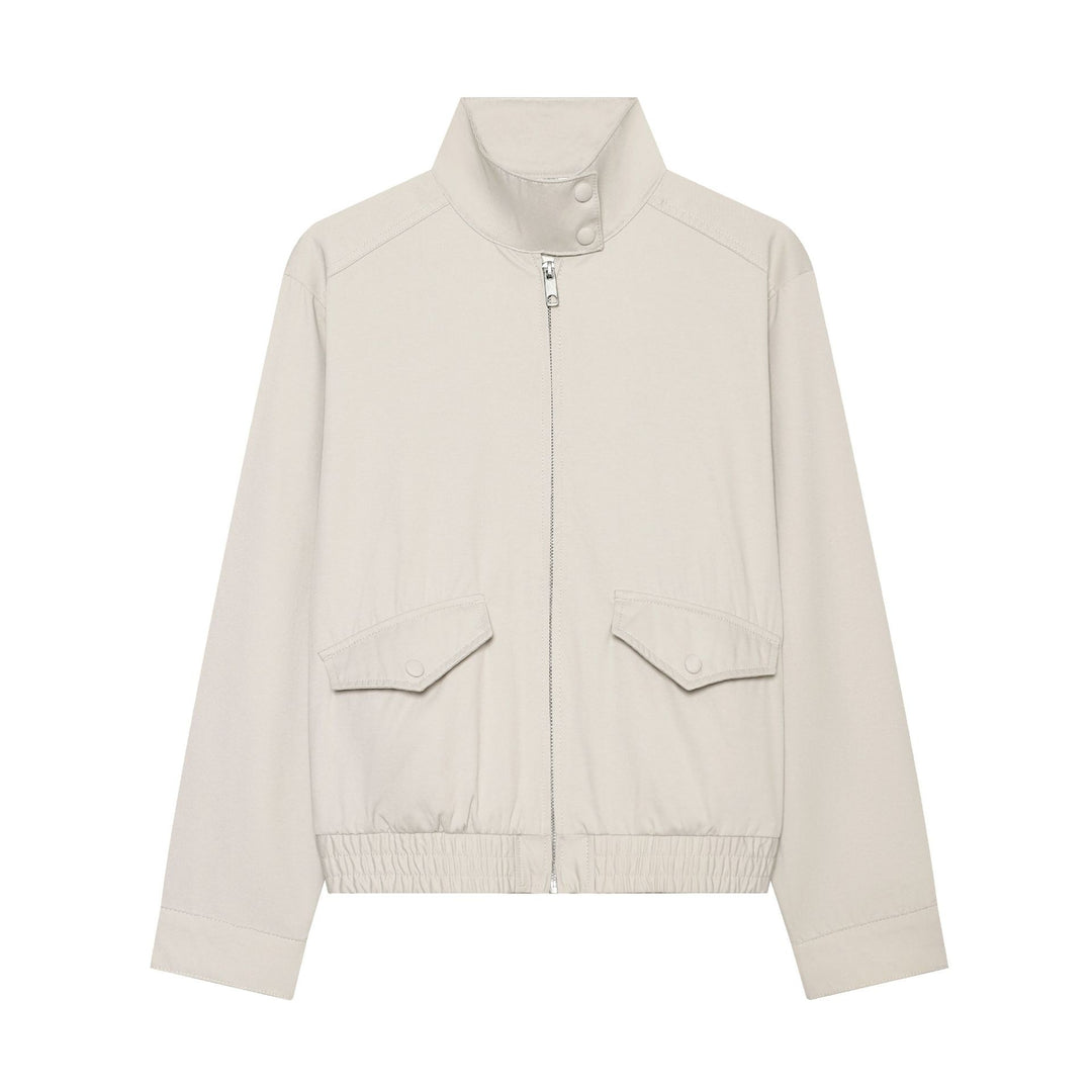 Women's short cut windbreaker with standing collar, press button placket, and elastic hem Mune Fashion