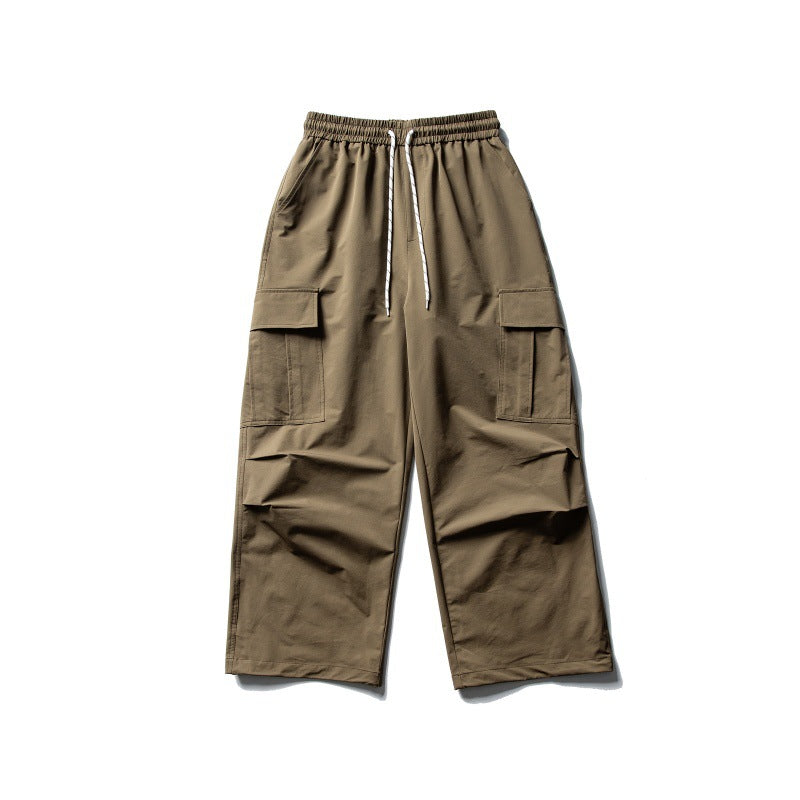 Unisex Wide Cargo Utility Pants in Baggy Cut with Elastic Drawstring Waist and Generous Flap Pockets