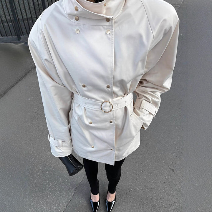 Women’s short trench coat in oversized look with extra wide lapel and snap button closure Mune Fashion
