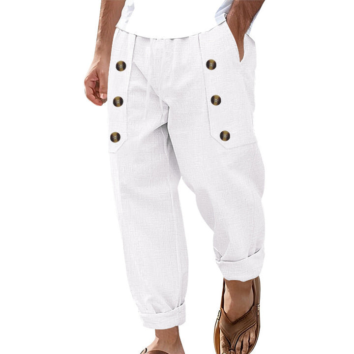 Men's loose linen trousers with decorative button stripes, rolled ankle cuffs, and side pockets Mune Fashion
