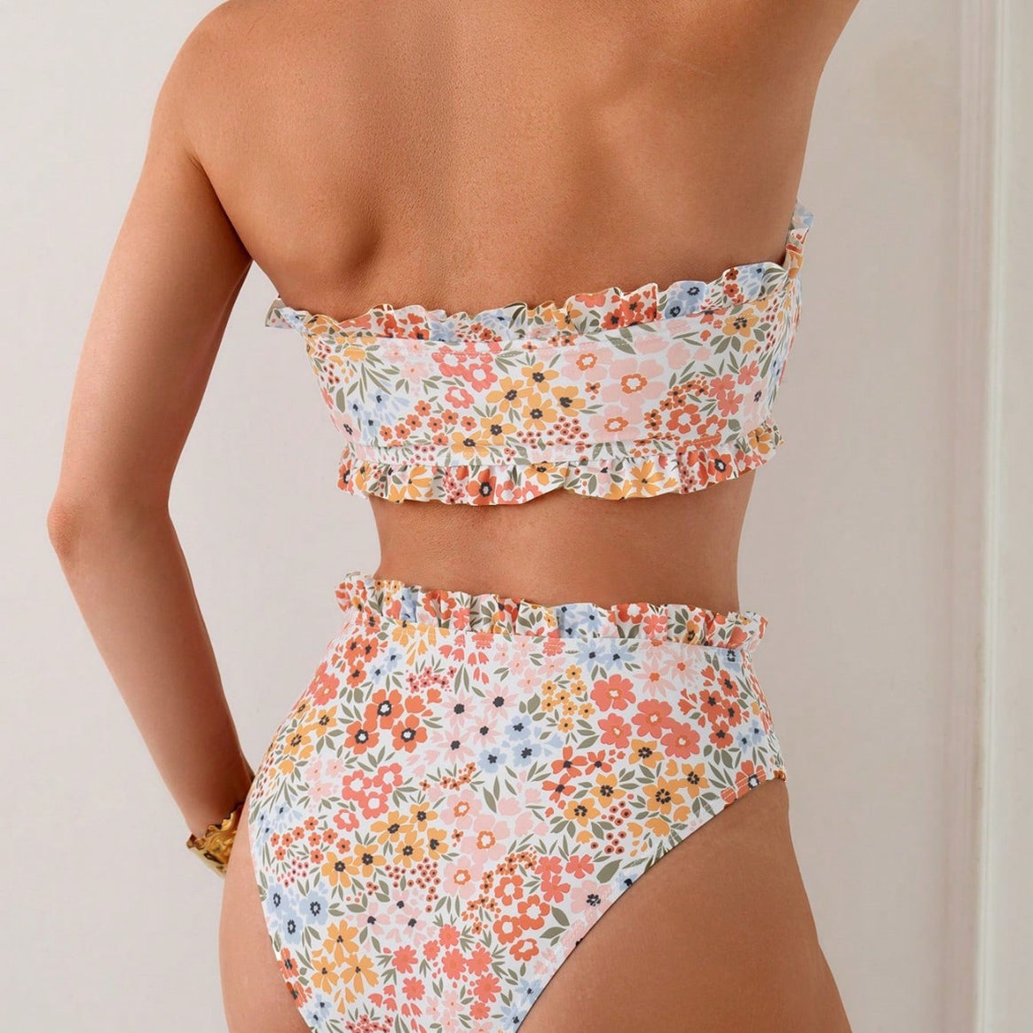 Women's bikini set with romantic ruffle details and high waistband Mune Fashion