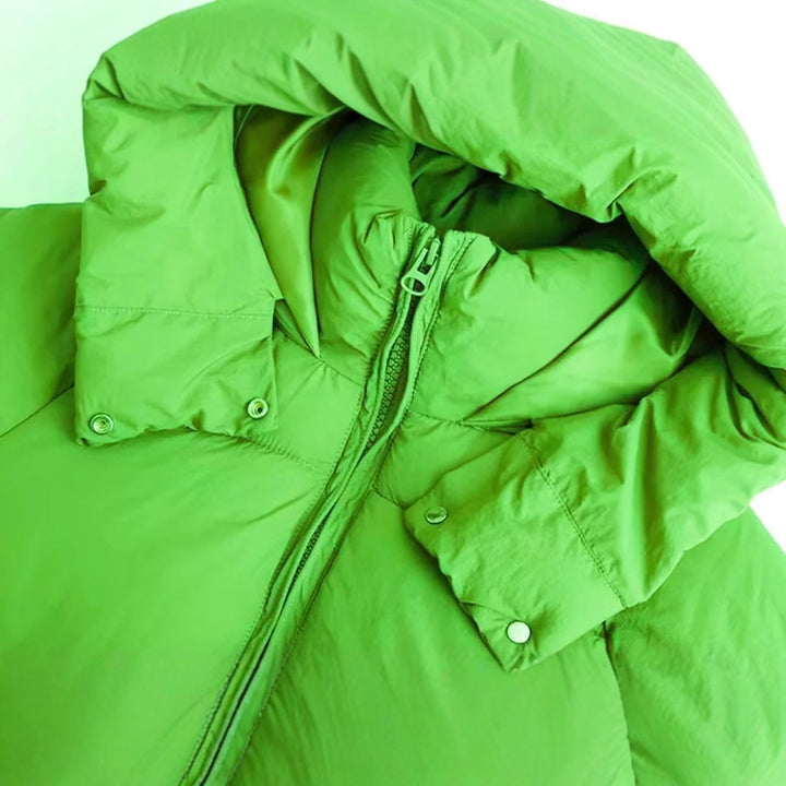 Women's quilted long puffer with high collar, concealed zip and drawstring hem Mune Fashion