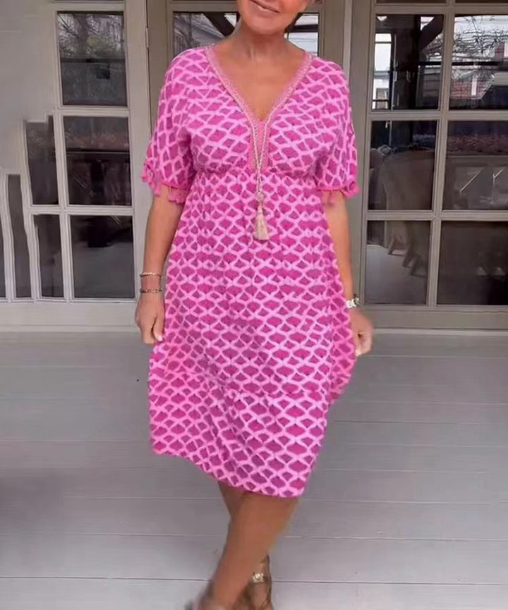 Women's casual V-neck beach dress with tassel tie and ruffle skirt Mune Fashion