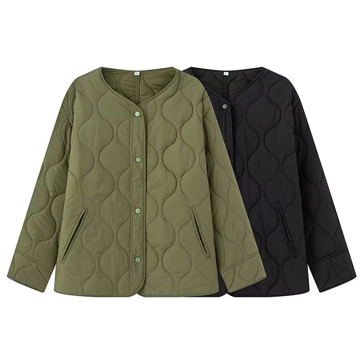 Women's quilted transitional jacket with round neck, snap button closure and wave-shaped quilting Mune Fashion