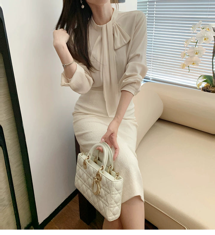 Women Elegant and figure-hugging blouse with bow detail Drune