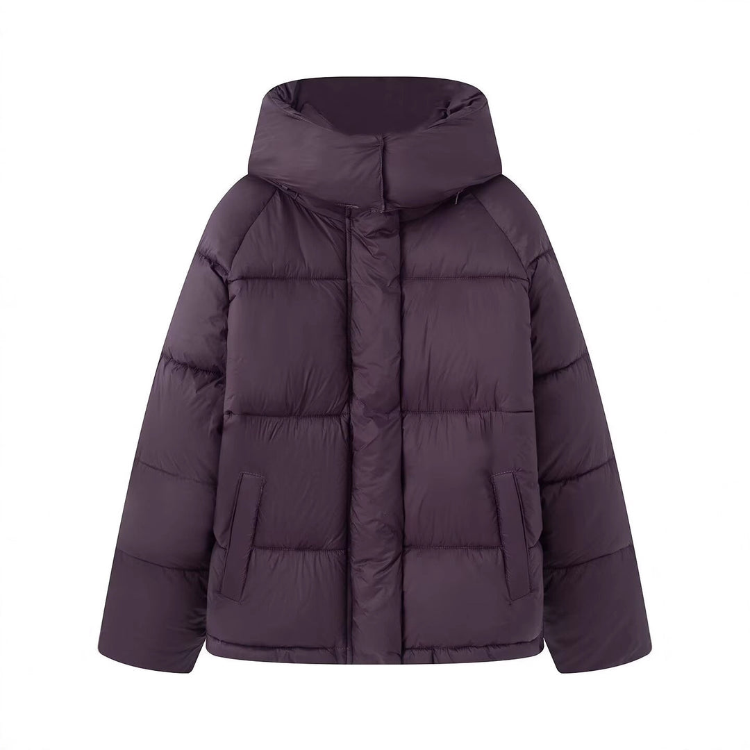 Women's short cut oversized quilted jacket with high collar and hood Mune Fashion