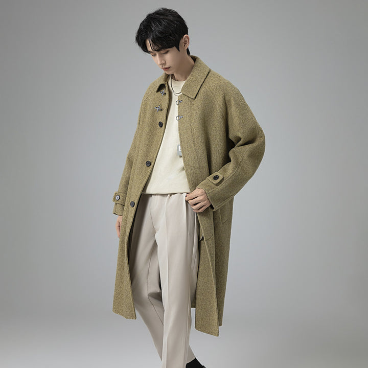 Men's floor-length wool blend coat in oversized cut with distinctive hook closures Mune Fashion