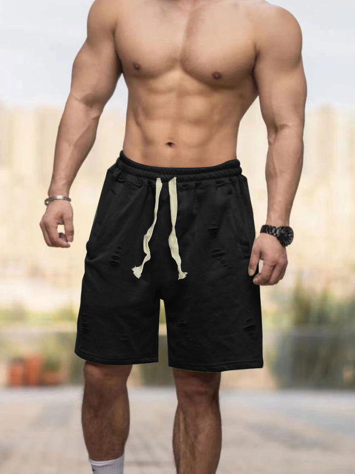 Men's casual sweat shorts with elastic drawstring waistband, side pockets, and used look Mune Fashion