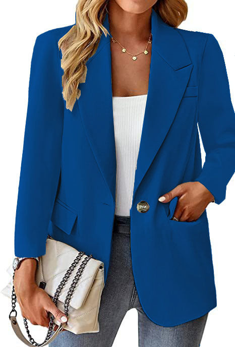 Ladies longline blazer in oversized style with a striking lapel, metal button, and patch pockets Mune Fashion