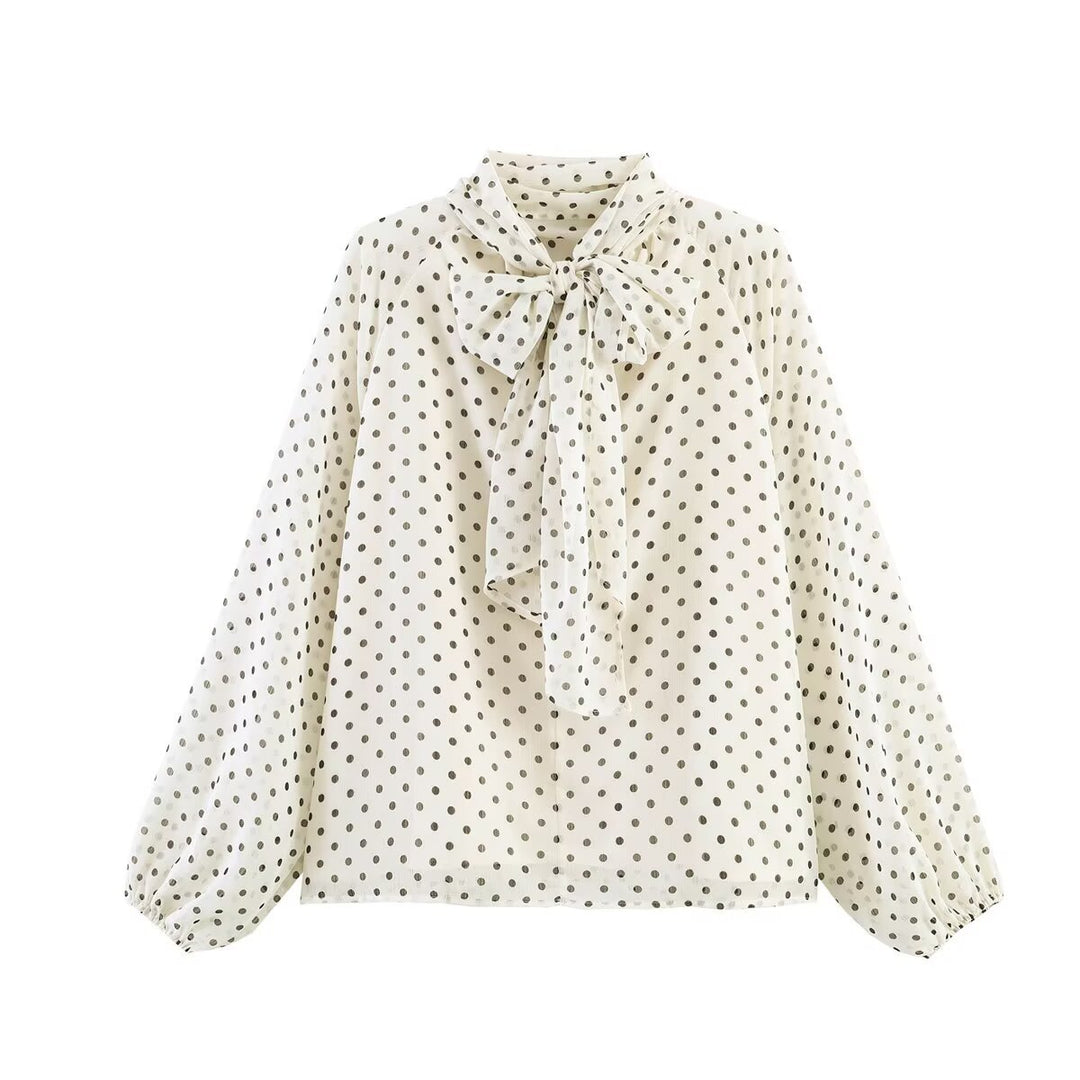 Women 50+ silk-like polka dot slip blouse with bow collar and balloon sleeves Mune Fashion