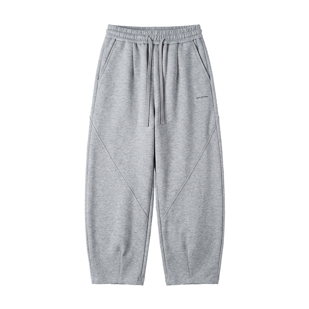 Men's loosely cut joggers with drawstring, decorative seams, and side pockets Mune Fashion