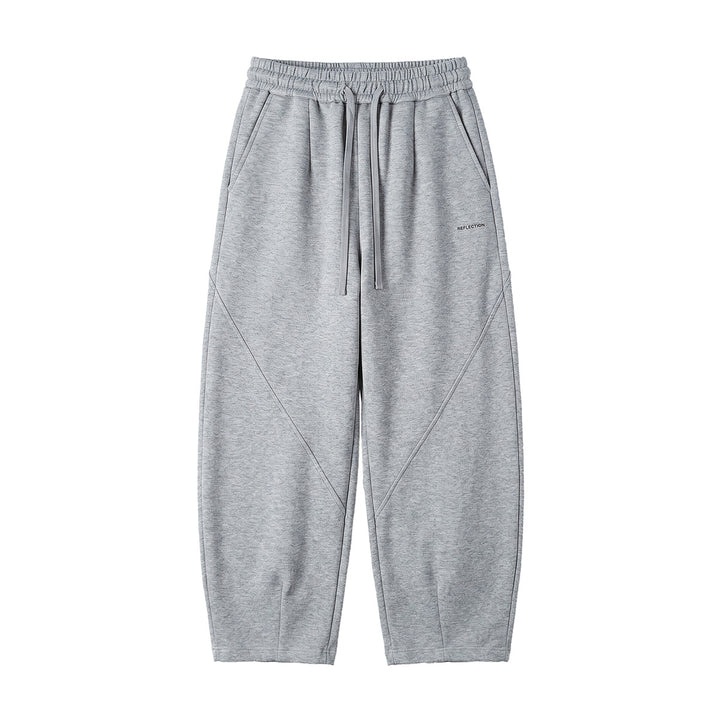 Men's loosely cut joggers with drawstring, decorative seams, and side pockets Mune Fashion