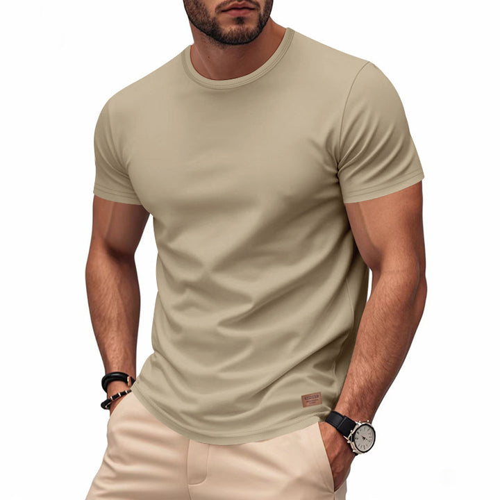 Men's slim round neck T-shirt made of smooth stretch jersey with subtle leather logo application Mune Fashion