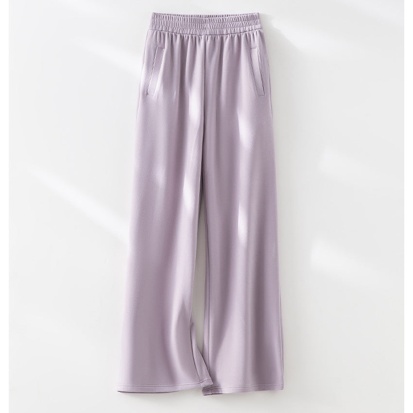 Women's wide lounge pants with elastic waistband and side pockets Mune Fashion