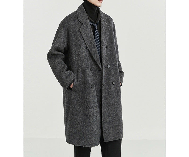 Men's oversized double-breasted wool coat with notched lapels and patch pockets Mune Fashion