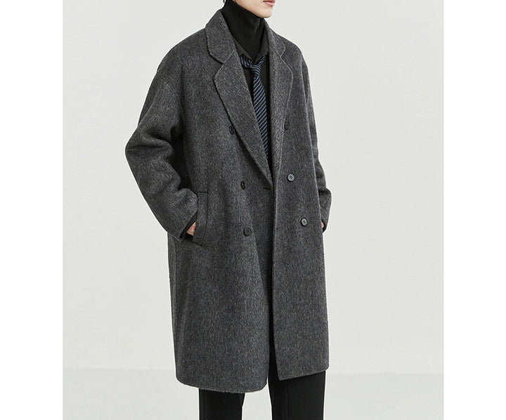 Men's oversized double-breasted wool coat with notched lapels and patch pockets Mune Fashion