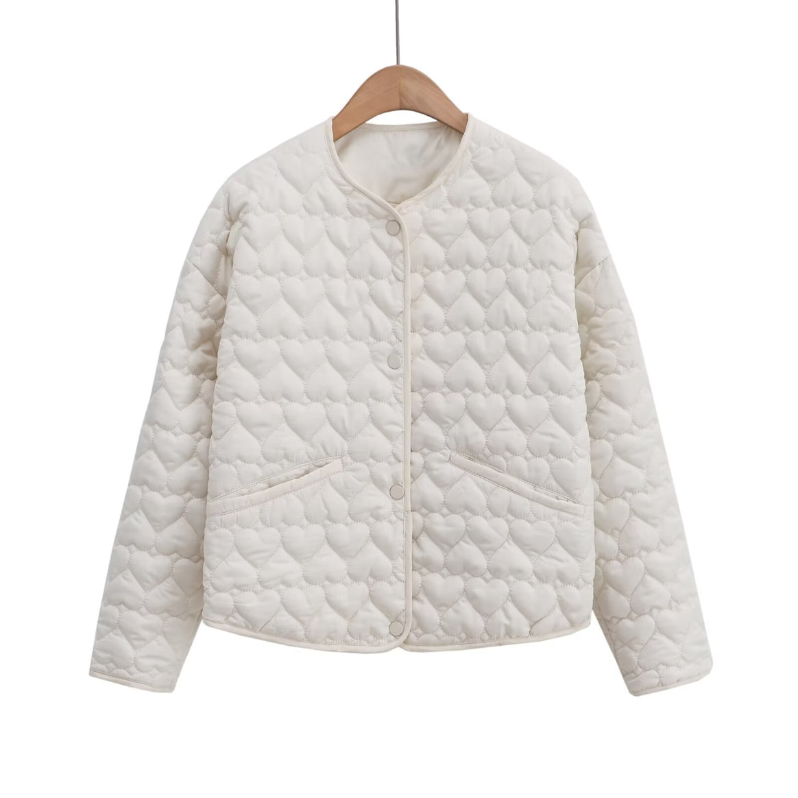 Women 100+ quilted short jacket with heart quilting, round neckline and snap buttons Mune Fashion