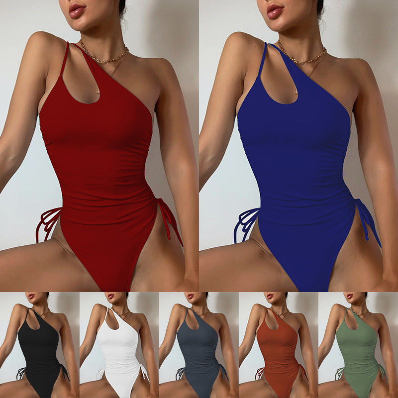 Women's one-piece swimsuit with asymmetrical cut and ruffle details Mune Fashion