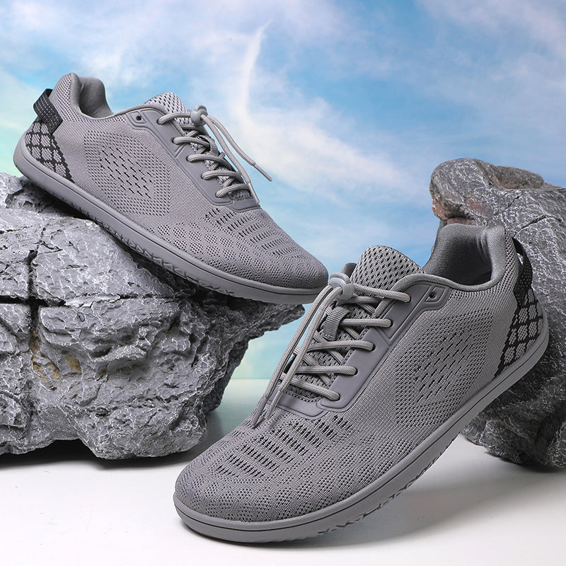 Unisex barefoot-inspired knitted sneaker with elastic fit, quick pull cord, and grippy full rubber sole Mune Fashion