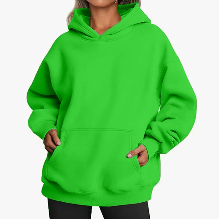 Women's oversized hooded sweatshirt with raglan sleeves, kangaroo pocket and soft fleece lining Mune Fashion