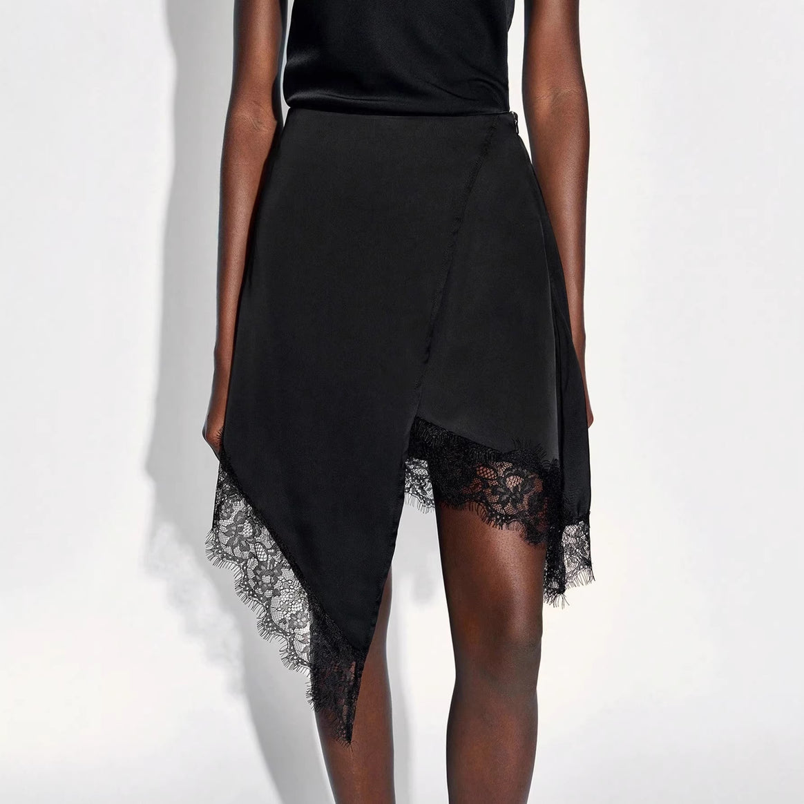 Women’s nan asymmetrical wrap skirt with lace trim and satin-like drape Mune Fashion