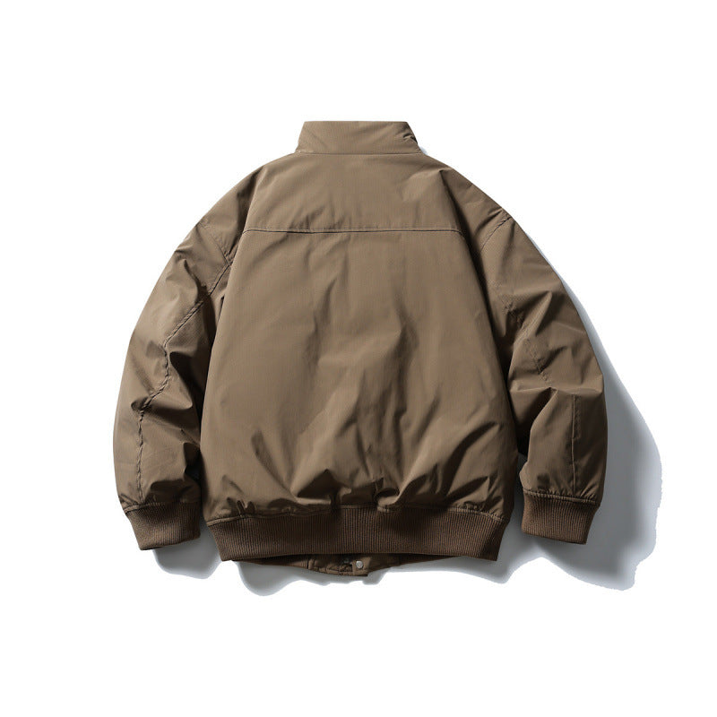 Unisex Stylishly cut padded bomber jacket with high stand-up collar and concealed front placket Mune Fashion