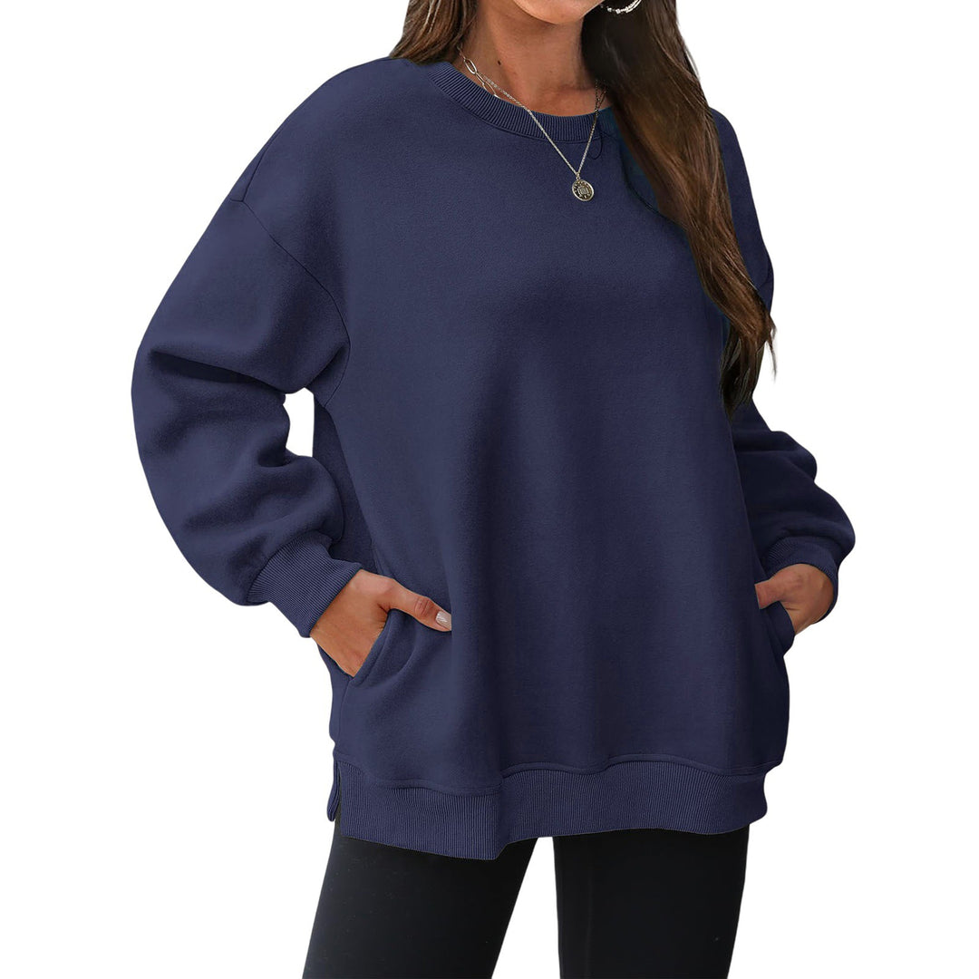 Women's extended oversized round neck sweater with side pockets, ribbed cuffs, and dropped shoulder Mune Fashion