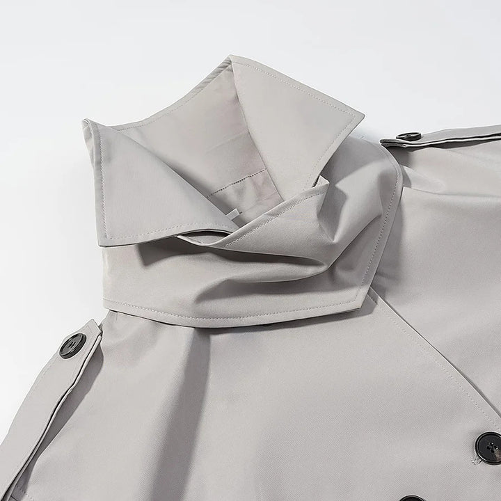 Women's short cut double-breasted trench coat with waist belt and high stand-up collar Mune Fashion