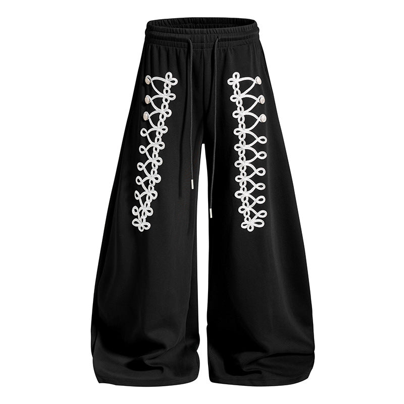 Women's loose jogging pants with elastic waistband and decorative lacing Mune Fashion