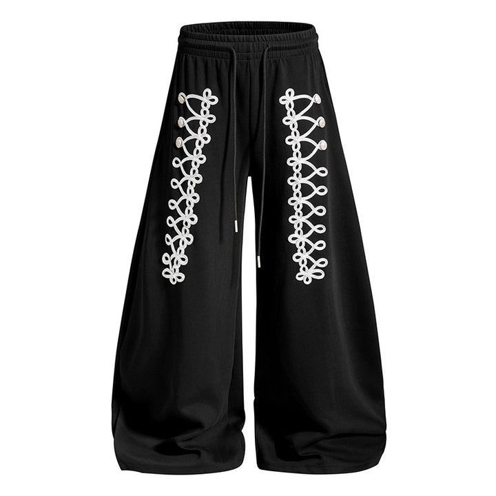 Women's loose jogging pants with elastic waistband and decorative lacing Mune Fashion