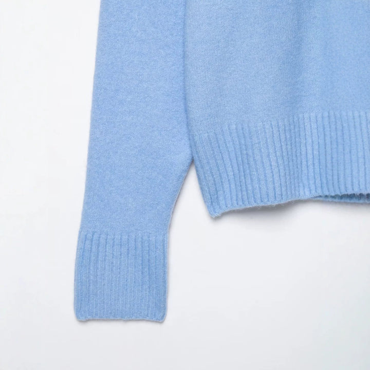 Women's Oversize V-Neck Knit Sweater with Deep Drop and Wide Ribbed Hem Drune