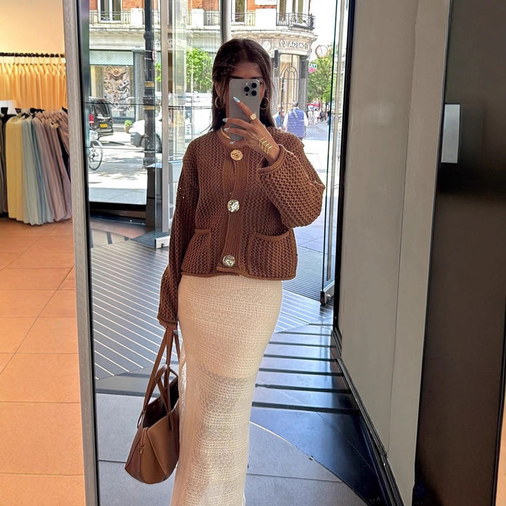 Women's cardigan with open mesh structure, decorative buttons and patch pockets Mune Fashion