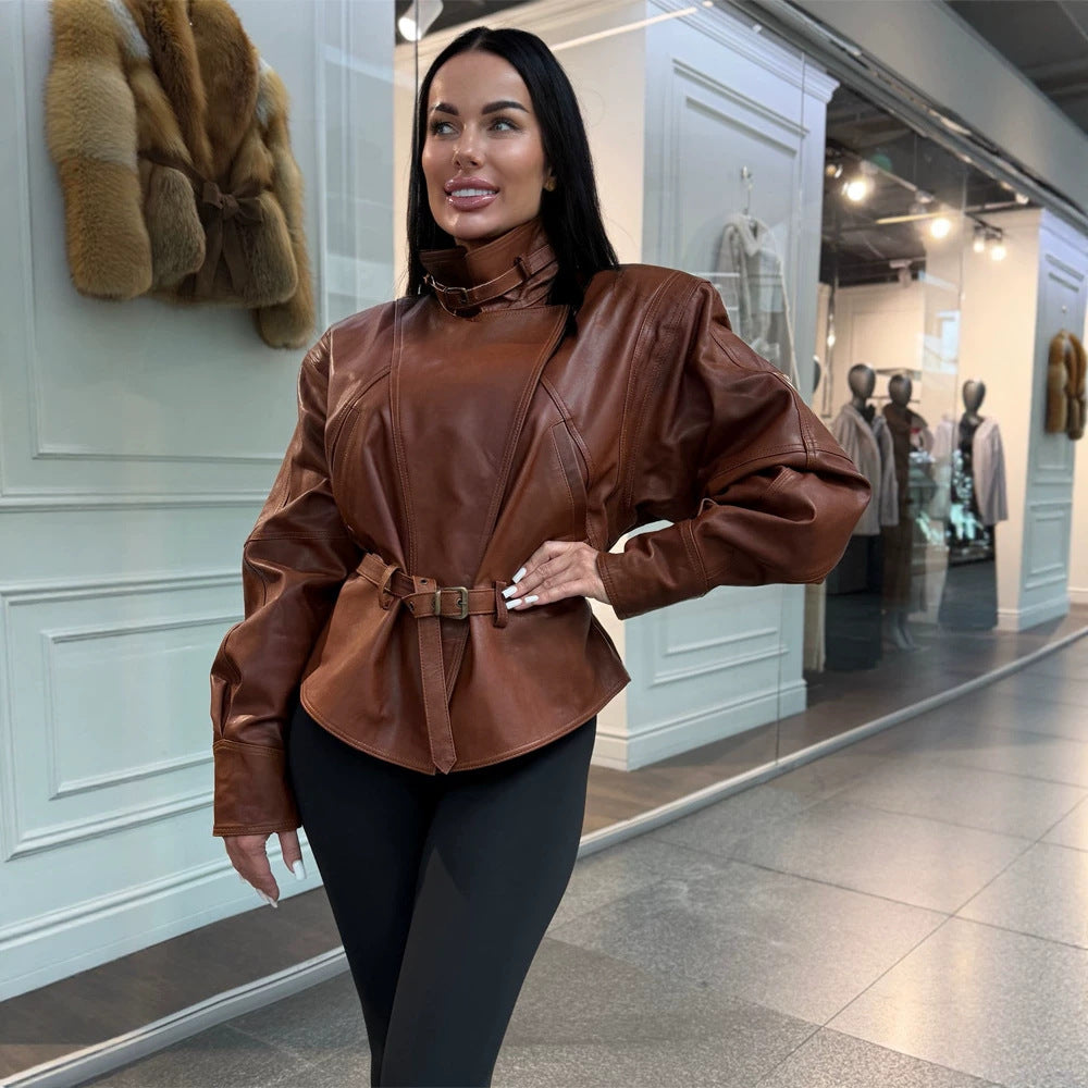 Women's tailored faux leather jacket with standing collar, neck strap, and figure-shaping waist belt Mune Fashion