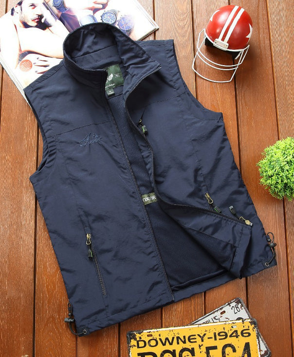 Men's utility outdoor vest with breathable mesh lining, zippered pockets, and adjustable hem Mune Fashion