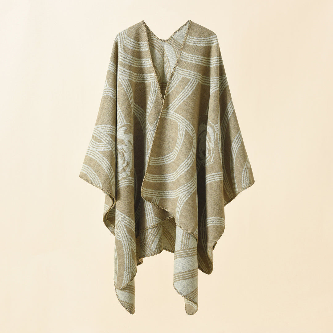 Ladies' collarless jacquard cape in a boxy oversized style with abstract medallion pattern