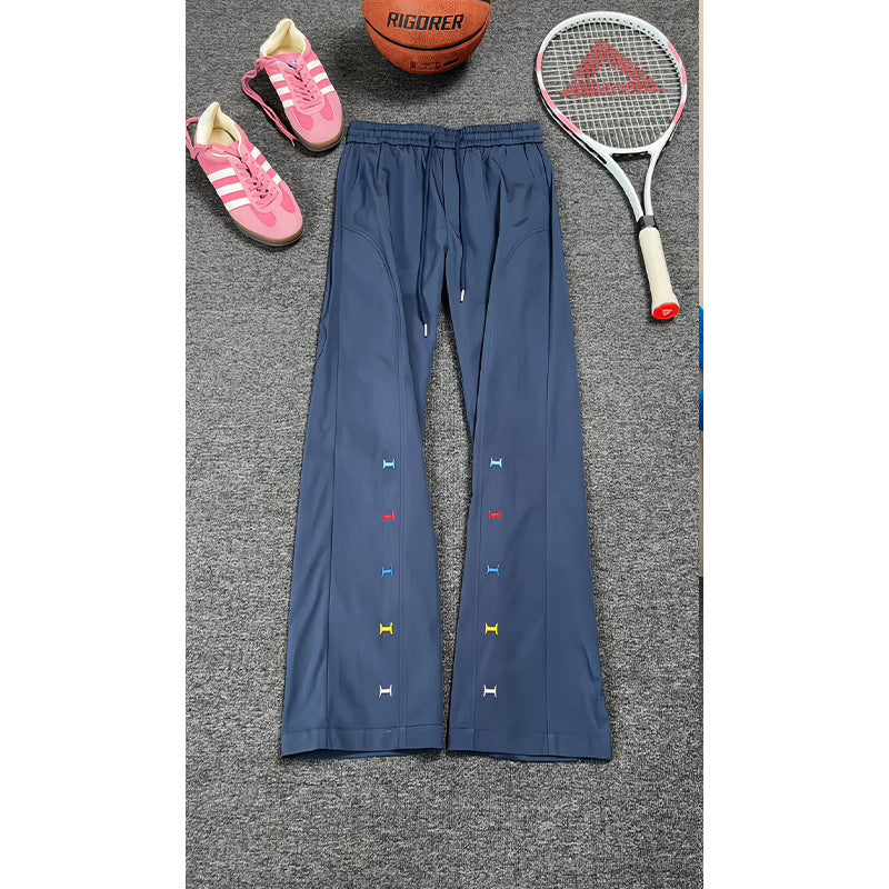 Women's sporty leisure pants with elastic waistband and colorful detail Mune Fashion