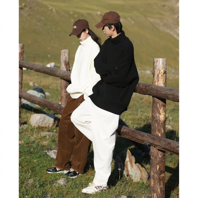 Women Oversized Turtleneck Sweater made of soft cotton blend with ribbed cuffs and extended hem Mune Fashion