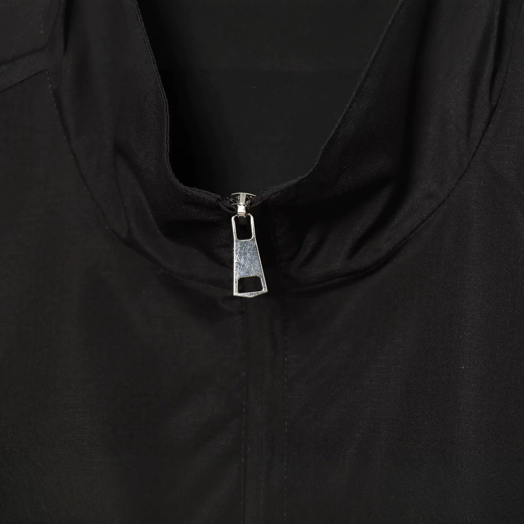 Women's lightweight adjustable windbreaker with stand-up collar, drawstring and tulle trim Mune Fashion