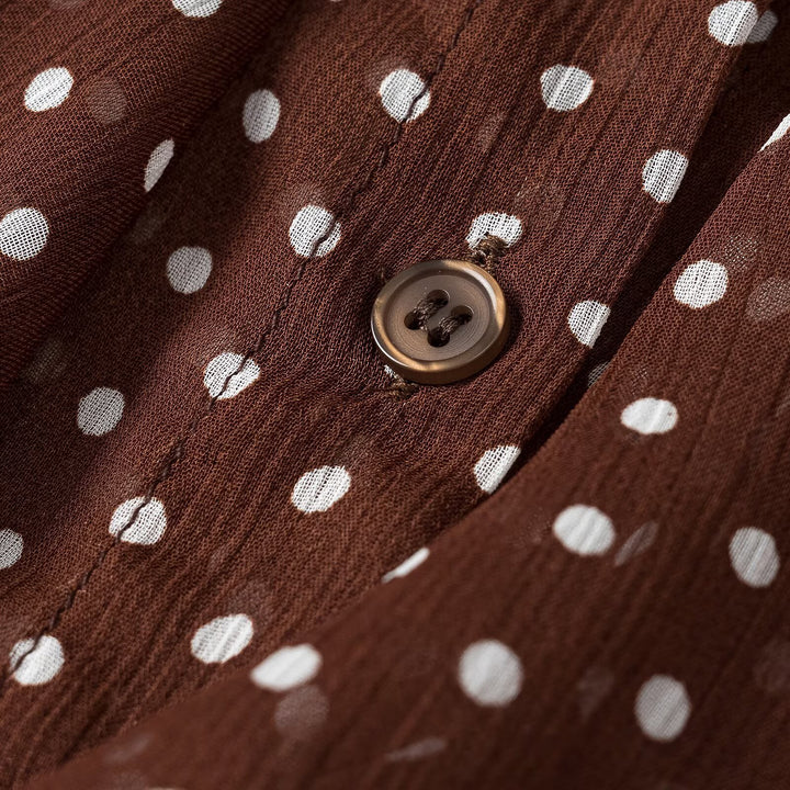 Women's semi-transparent chiffon blouse with dots, ruffle details and bow collar Mune Fashion