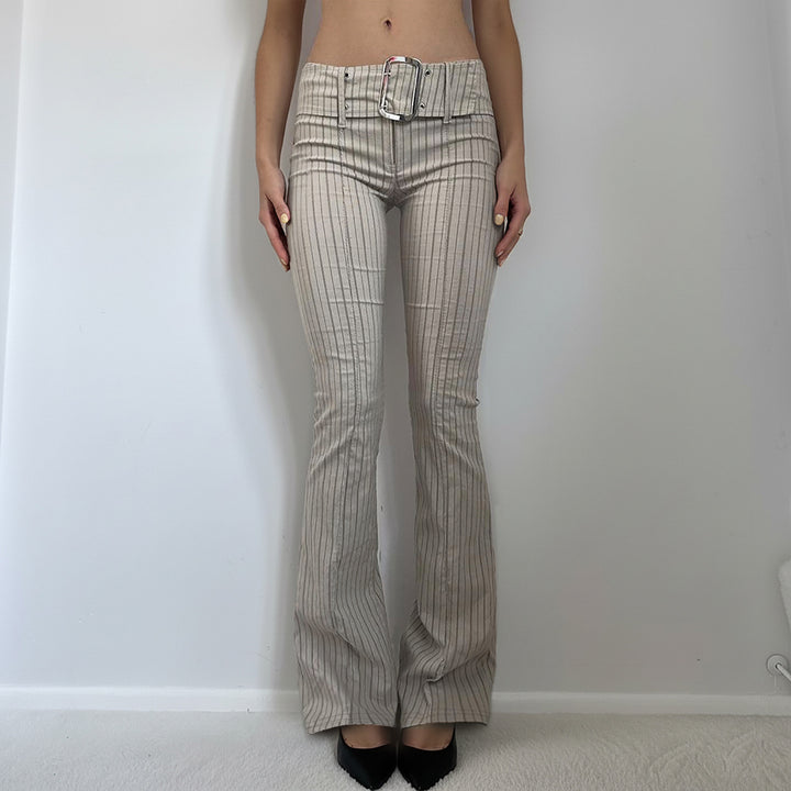 Women’s high-waisted pinstripe flared trousers with wide tie belt and figure-enhancing crease Mune Fashion