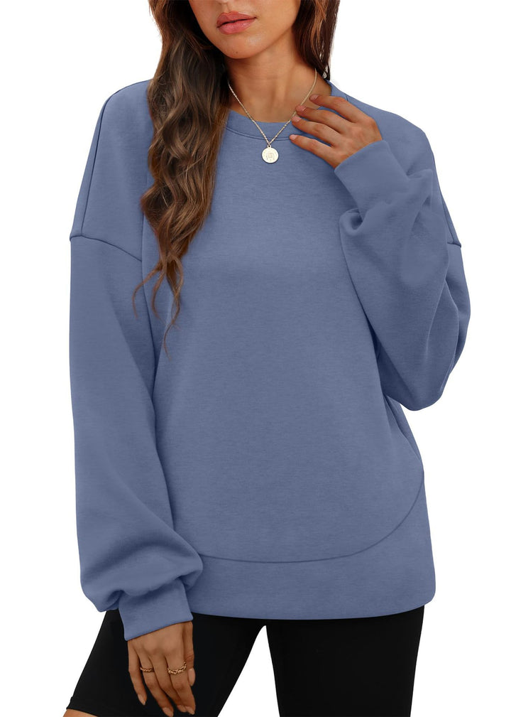 Women's casual oversized round neck sweatshirt with dropped shoulder, rounded hem, and soft inner lining Mune Fashion
