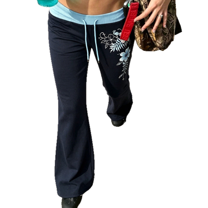 Women’s flared lounge pants with high stretch waistband, drawstring and floral print Mune Fashion