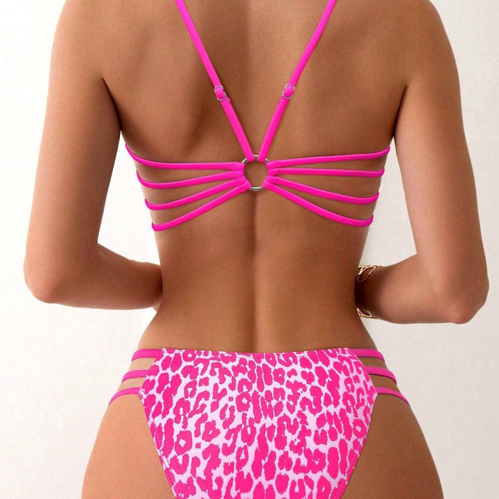 Ladies bikini set with vibrant leopard pattern and sporty accents Mune Fashion