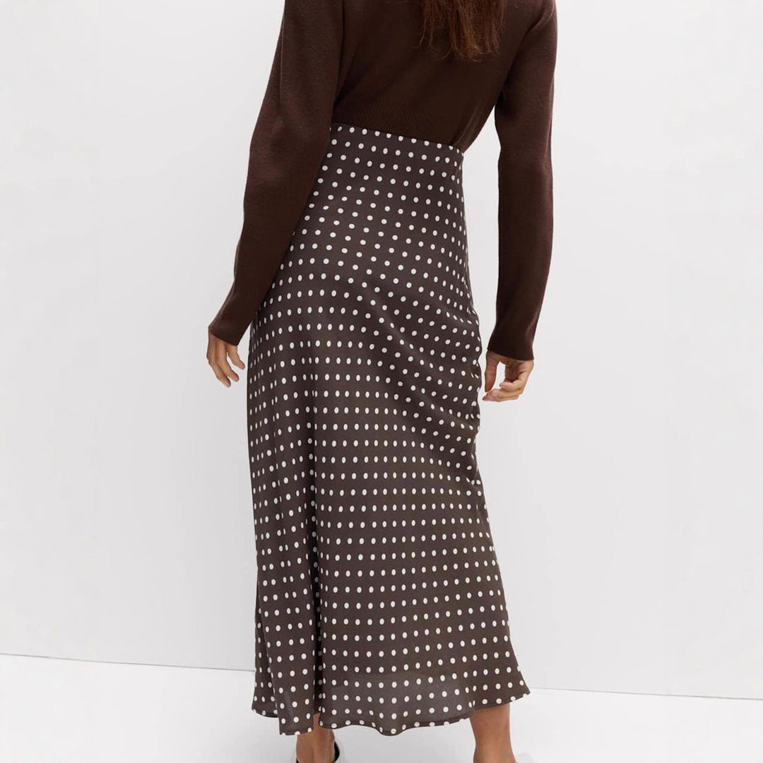 Women's midi skirt with polka dot pattern, asymmetrical hem and side slit Mune Fashion