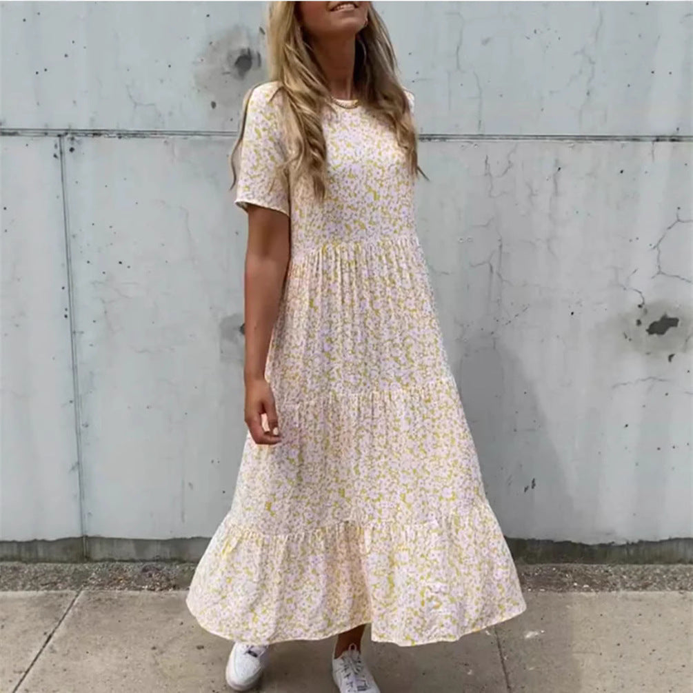 Women's flowing tiered maxi dress in Boho babydoll style with gathered underbust and short sleeves Mune Fashion