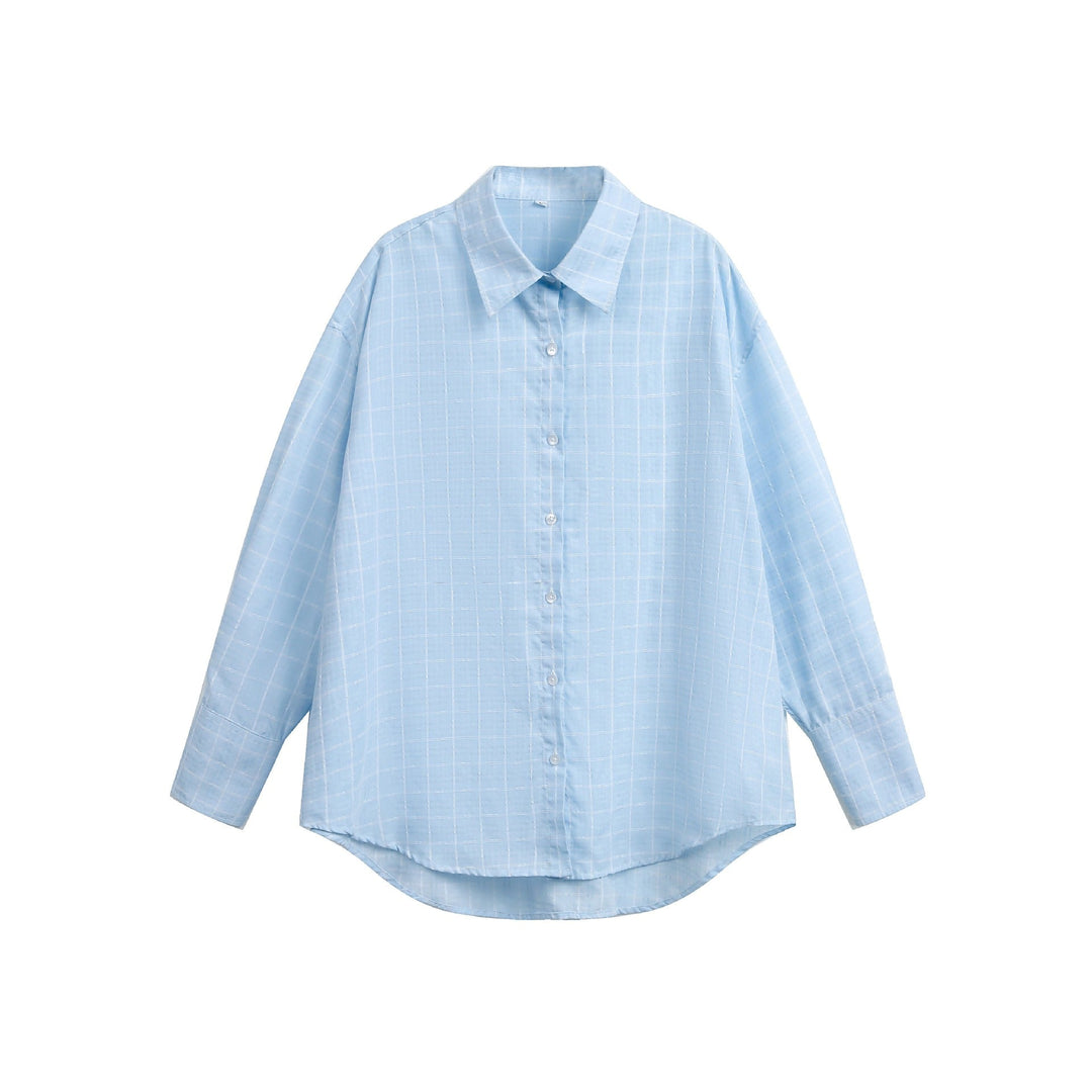 Women's oversized blouse with fine check pattern, drop shoulder and extended back part.
