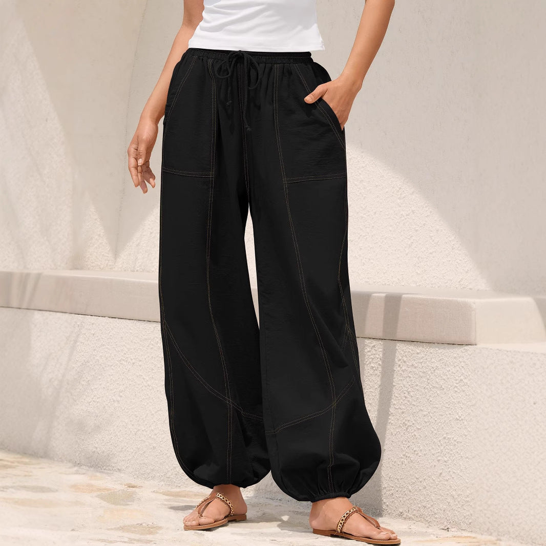 Women's wide harem pants with drawstring, patch pockets, and elastic ankle cuffs Mune Fashion