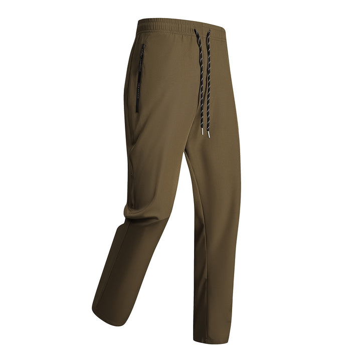 Men's sporty training pants with elastic waistband and zippered pockets Mune Fashion
