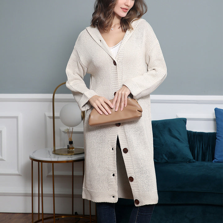 Women's Hooded Long Cardigan made of medium-thick ribbed knit with a full button placket and loose oversized cut Mune Fashion