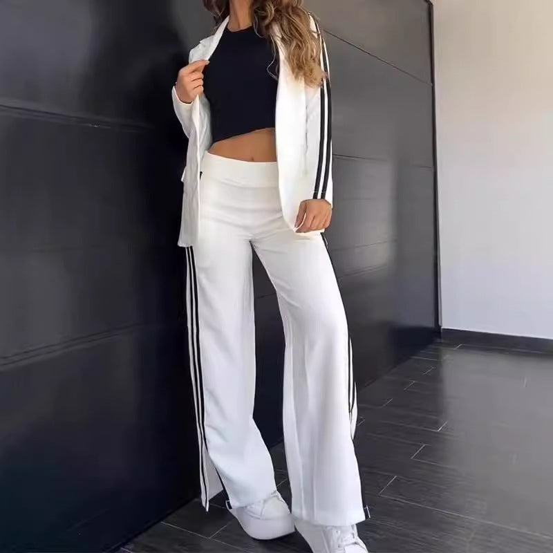Ladies nan sporty-elegant two-piece blazer set with fitted blazer and wide jogging pants cut with side stripes Mune Fashion